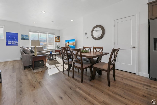25 E Center Unit 10, North Salt Lake, UT 84054 - dining area with recessed lighting, light wood finished floors, and baseboards