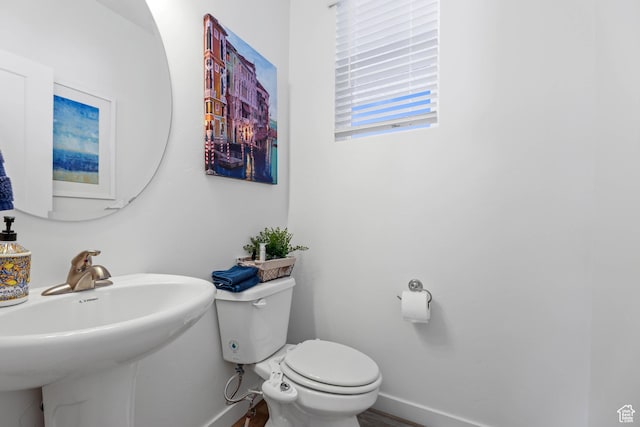 25 E Center Unit 10, North Salt Lake, UT 84054 - half bath with toilet, baseboards, and a sink