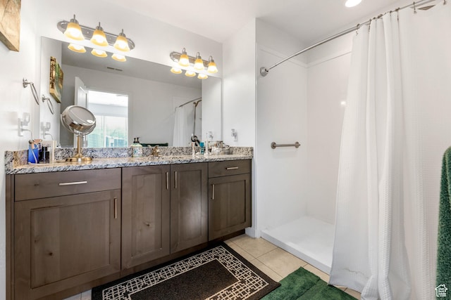 25 E Center Unit 10, North Salt Lake, UT 84054 - full bath featuring visible vents, a shower with curtain, tile patterned flooring, and vanity
