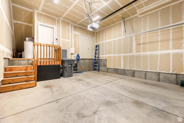 25 E Center Unit 10, North Salt Lake, UT 84054 - garage featuring electric panel and a garage door opener