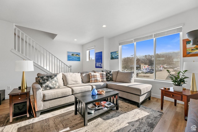 25 E Center Unit 10, North Salt Lake, UT 84054 - living room featuring wood finished floors, recessed lighting, and stairway