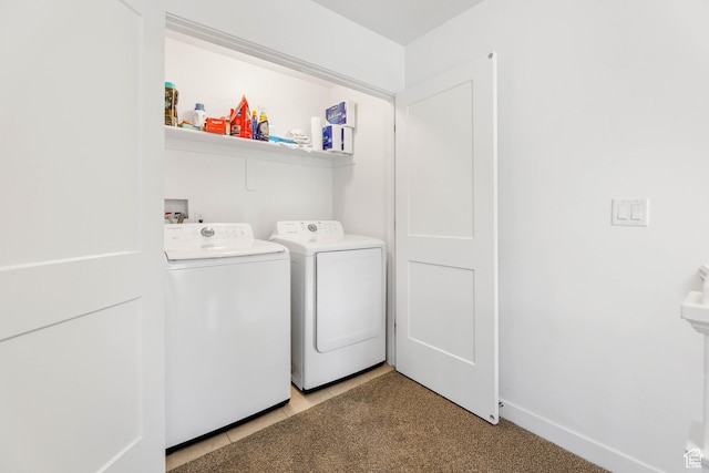 25 E Center Unit 10, North Salt Lake, UT 84054 - clothes washing area featuring washer and clothes dryer, laundry area, and baseboards
