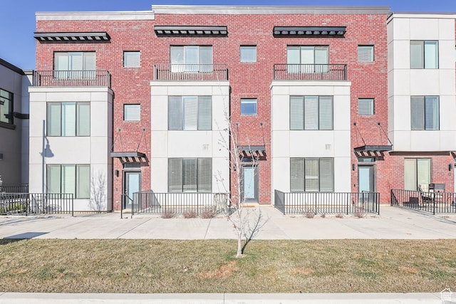 exterior space with brick siding