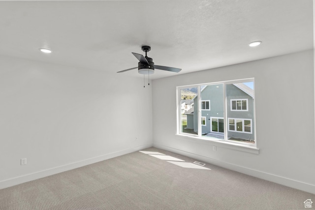 unfurnished room featuring ceiling fan, baseboards, recessed lighting, and carpet floors