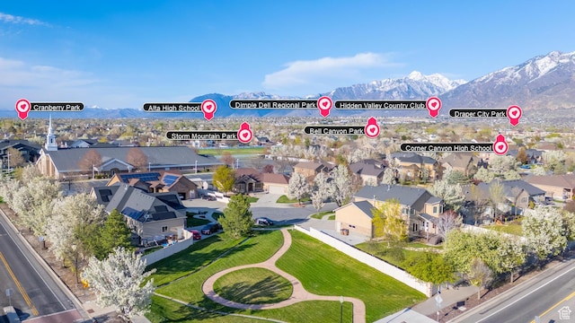 drone / aerial view featuring a mountain view and a residential view