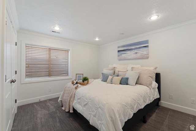 bedroom featuring recessed lighting, wood finished floors, visible vents, ornamental molding, and baseboards