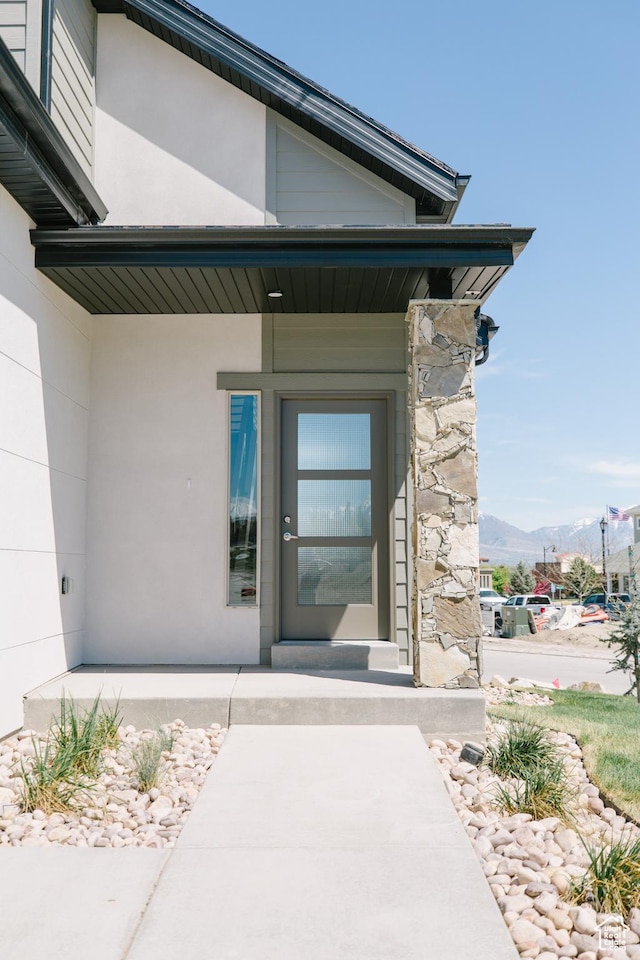 174 W Autumn Ln N Unit 138, Saratoga Springs, UT 84045 - entrance to property featuring a porch, a mountain view, and stone siding