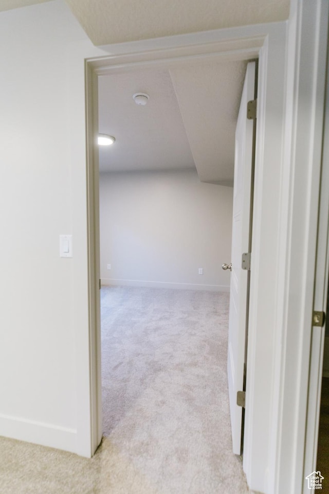174 W Autumn Ln N Unit 138, Saratoga Springs, UT 84045 - hallway with light colored carpet and baseboards