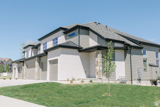 174 W Autumn Ln N Unit 138, Saratoga Springs, UT 84045 - prairie-style house featuring roof with shingles, a garage, driveway, and a front lawn
