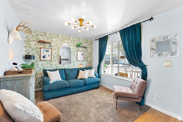 1480 W 650 S, Lehi, UT 84043 - living area featuring an inviting chandelier, a textured ceiling, an accent wall, wallpapered walls, and baseboards