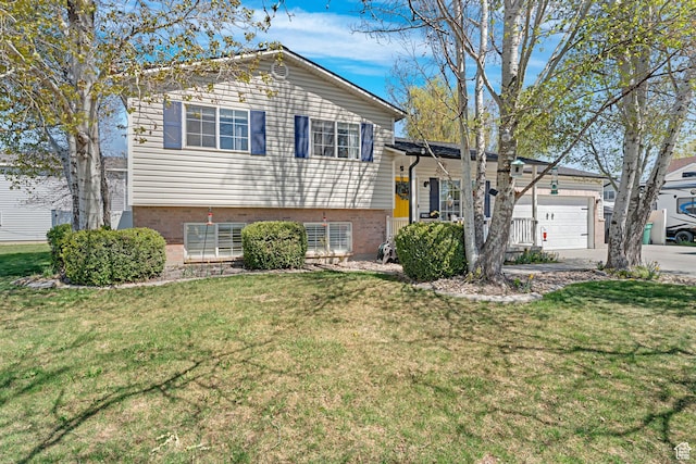 1480 W 650 S, Lehi, UT 84043 - split level home with brick siding, an attached garage, a front lawn, and concrete driveway