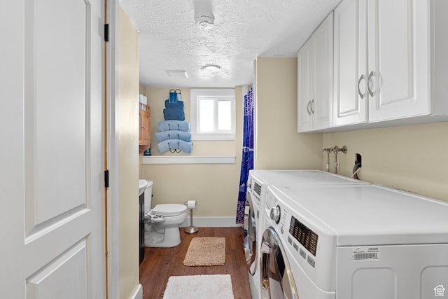 1480 W 650 S, Lehi, UT 84043 - clothes washing area with dark wood-type flooring, baseboards, washer and dryer, and a textured ceiling