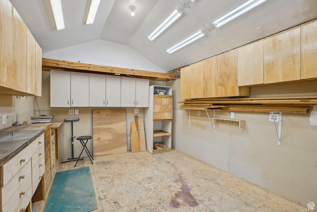 kitchen featuring lofted ceiling