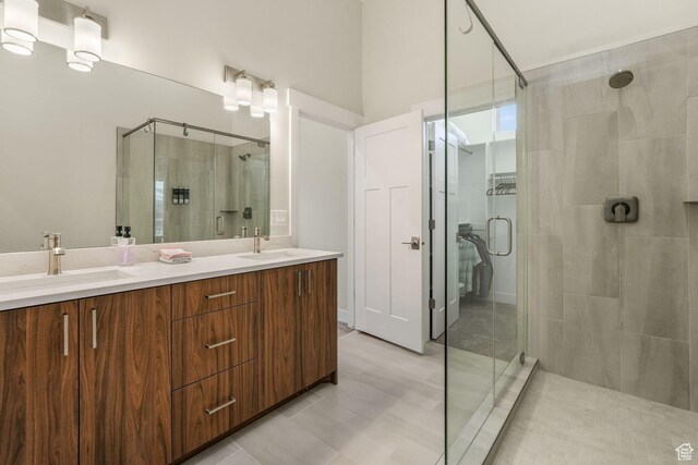 4788 E Paddleford Dr, Eden, UT 84310 - bathroom featuring a sink, tile patterned flooring, double vanity, and a stall shower