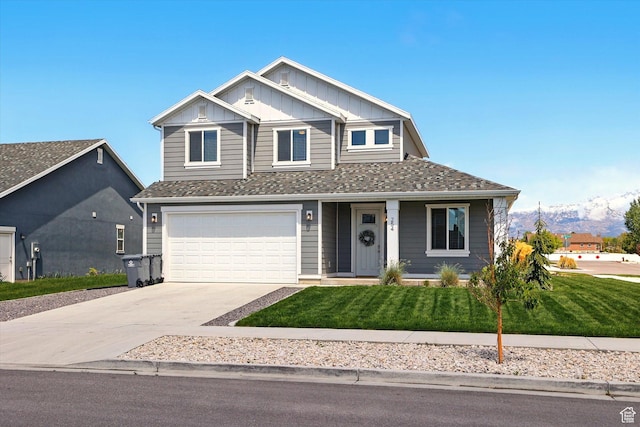 254 W 720 S, American Fork, UT 84003 - craftsman-style house with board and batten siding, driveway, a garage, a front lawn, and a porch
