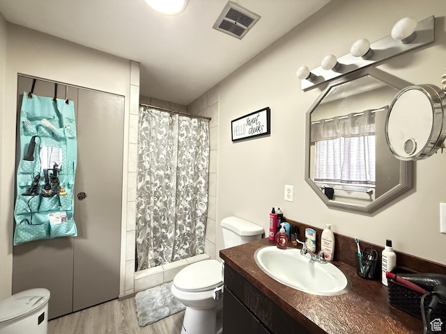 24 S 400 W, Kaysville, UT 84037 - full bathroom featuring visible vents, a stall shower, toilet, and wood finished floors