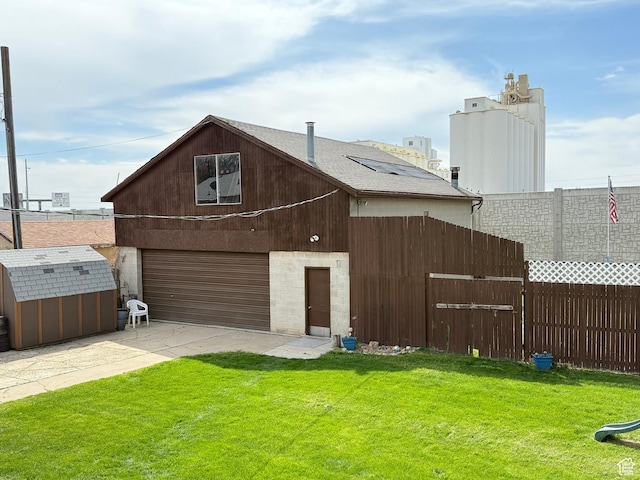 24 S 400 W, Kaysville, UT 84037 - exterior space with a yard, driveway, fence, and an outbuilding