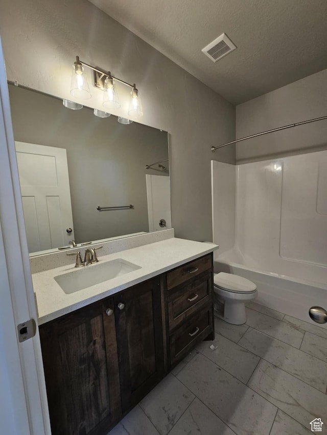 1628 S 3170 E, Spanish Fork, UT 84660 - full bathroom with vanity, toilet, visible vents, shower / bathing tub combination, and marble finish floor