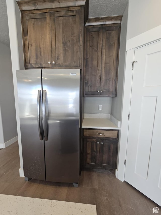 1628 S 3170 E, Spanish Fork, UT 84660 - kitchen featuring freestanding refrigerator, dark wood finished floors, dark brown cabinets, light countertops, and baseboards