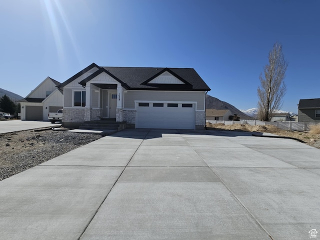 1628 S 3170 E, Spanish Fork, UT 84660 - ranch-style house featuring concrete driveway and stone siding