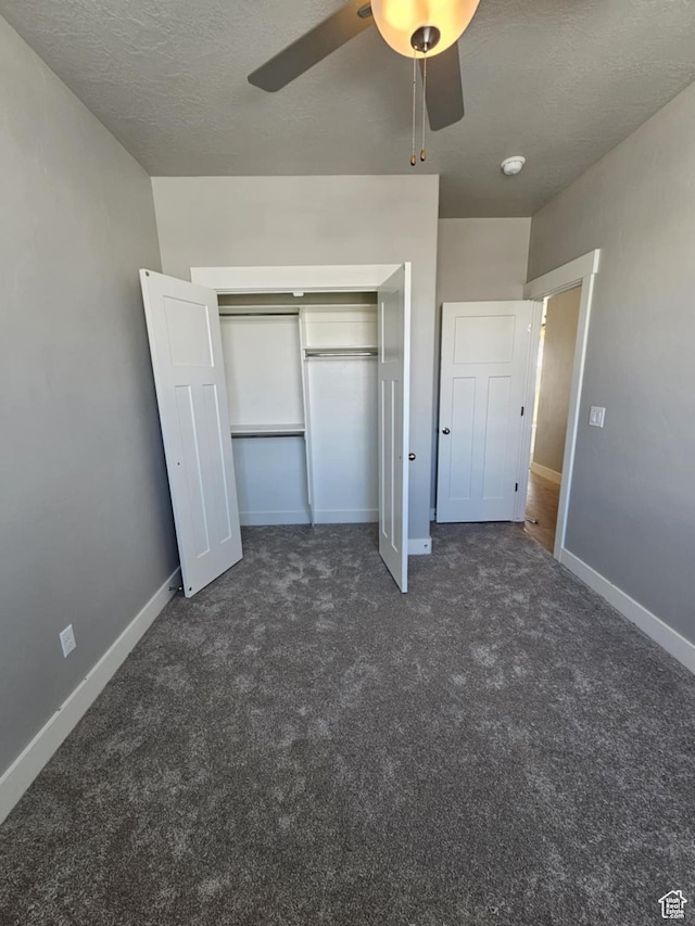 1628 S 3170 E, Spanish Fork, UT 84660 - unfurnished bedroom featuring dark colored carpet, a closet, and baseboards
