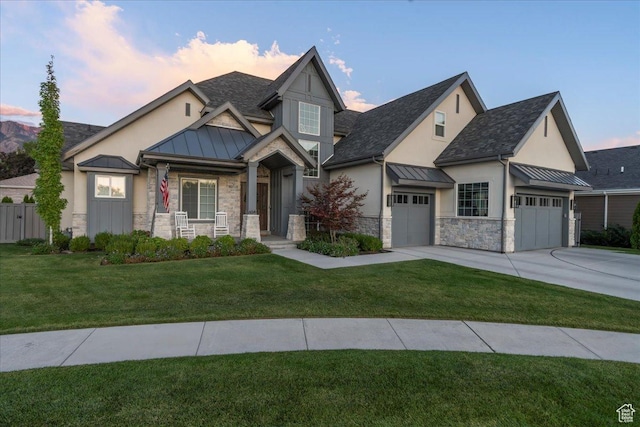 craftsman-style home featuring stone siding, metal roof, a standing seam roof, and stucco siding