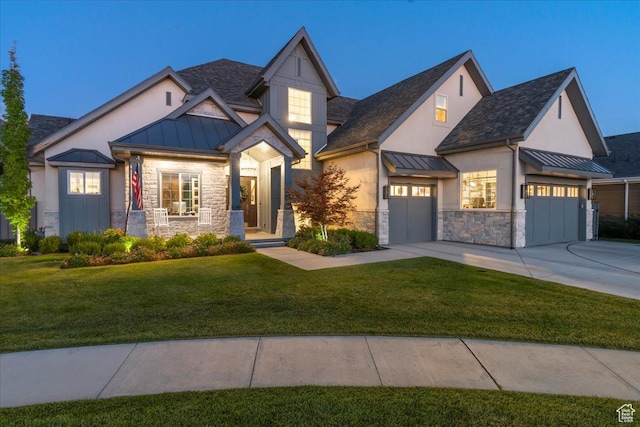 craftsman house featuring a standing seam roof, metal roof, stucco siding, and stone siding