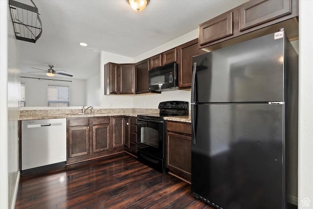 171 S Carrick Dr, Salt Lake City, UT 84115 - kitchen with light stone countertops, dark brown cabinetry, dark wood-style flooring, and black appliances
