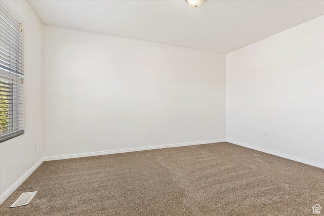 171 S Carrick Dr, Salt Lake City, UT 84115 - carpeted spare room with visible vents and baseboards