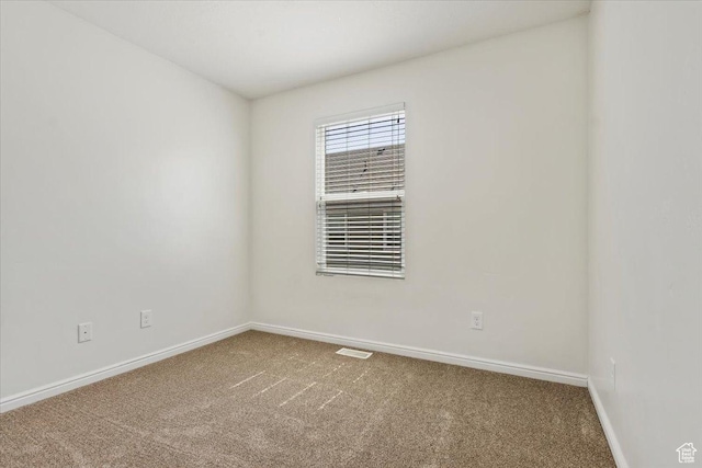 171 S Carrick Dr, Salt Lake City, UT 84115 - spare room featuring carpet floors, baseboards, and visible vents
