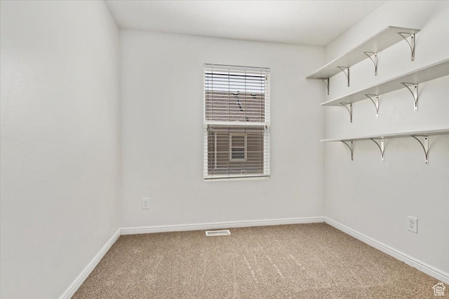 171 S Carrick Dr, Salt Lake City, UT 84115 - carpeted empty room featuring visible vents and baseboards