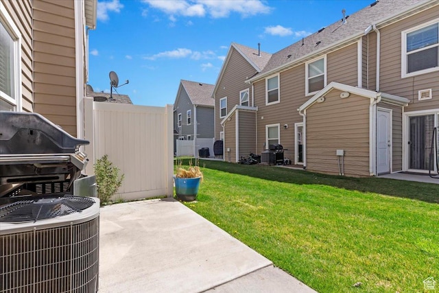 171 S Carrick Dr, Salt Lake City, UT 84115 - view of yard featuring a patio area, a residential view, and central AC