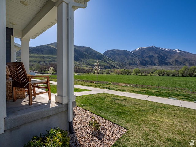 view of mountain feature with a rural view