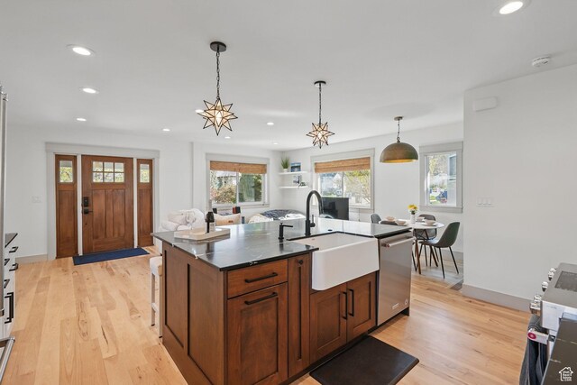 1148 E Kensington Ave, Salt Lake City, UT 84105 - kitchen with a sink, stainless steel dishwasher, recessed lighting, and light wood-style floors