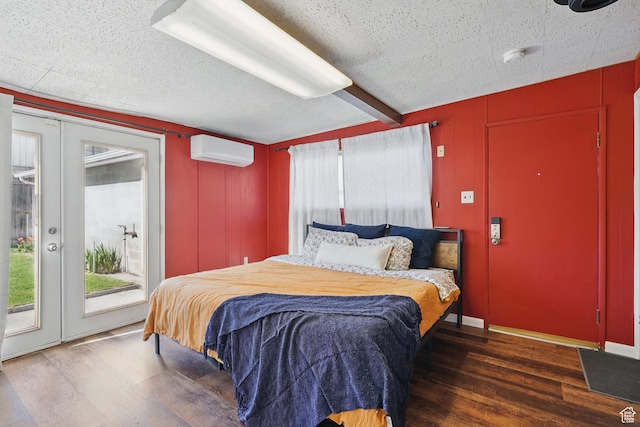 1148 E Kensington Ave, Salt Lake City, UT 84105 - bedroom featuring access to exterior, multiple windows, an AC wall unit, and wood finished floors
