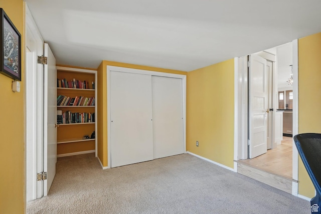 1148 E Kensington Ave, Salt Lake City, UT 84105 - unfurnished bedroom featuring baseboards and carpet
