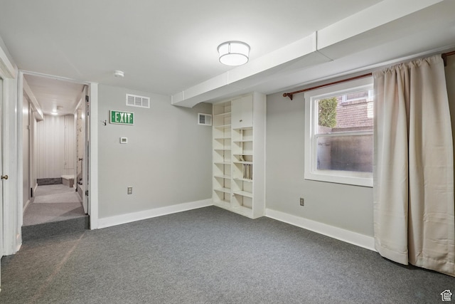 1148 E Kensington Ave, Salt Lake City, UT 84105 - basement with visible vents, baseboards, and dark colored carpet