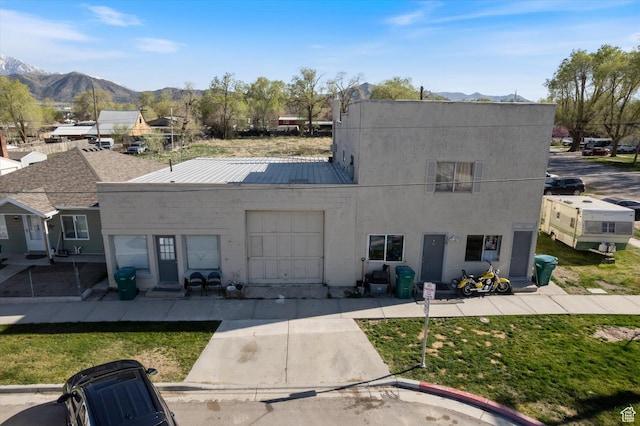view of building exterior featuring a mountain view