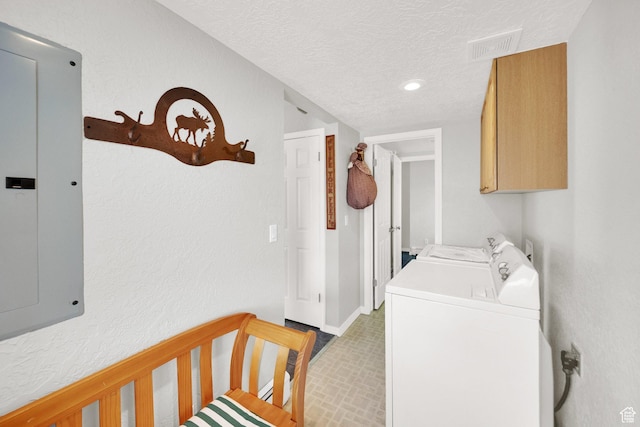 9906 E Lake Pines Dr Unit 1187, Heber City, UT 84032 - laundry area with electric panel, cabinet space, a textured ceiling, visible vents, and washing machine and clothes dryer