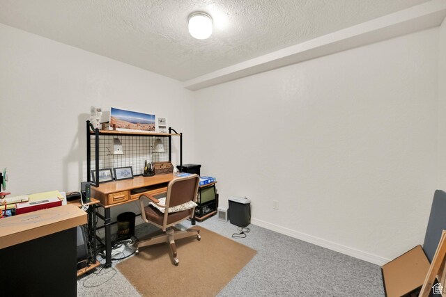 9906 E Lake Pines Dr Unit 1187, Heber City, UT 84032 - home office featuring a textured ceiling, carpet, and baseboards