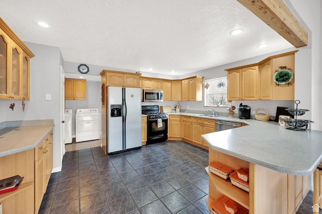 9906 E Lake Pines Dr Unit 1187, Heber City, UT 84032 - kitchen featuring a peninsula, open shelves, washing machine and clothes dryer, stainless steel appliances, and a textured ceiling