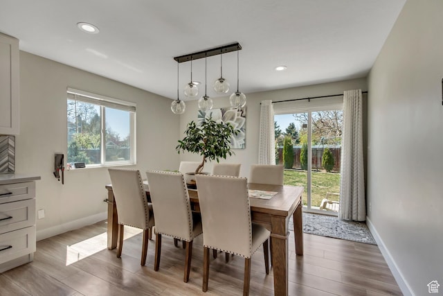 10078 S Shetland Cir S, Jordan, UT 84009 - dining area featuring recessed lighting, a wealth of natural light, light wood finished floors, and baseboards