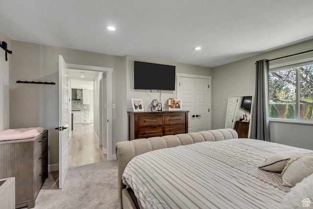 10078 S Shetland Cir S, Jordan, UT 84009 - bedroom with a closet, recessed lighting, light colored carpet, and a barn door
