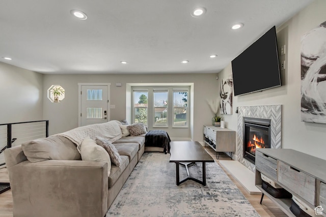 10078 S Shetland Cir S, Jordan, UT 84009 - living area featuring recessed lighting, light wood-style floors, and a fireplace