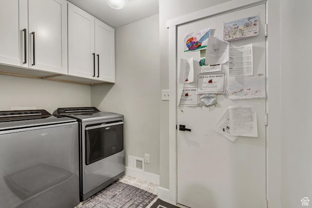 10078 S Shetland Cir S, Jordan, UT 84009 - clothes washing area with washer and dryer, visible vents, baseboards, and cabinet space