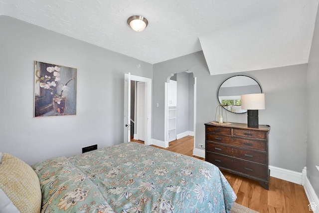 408 E 1700 S, Salt Lake City, UT 84115 - bedroom with baseboards and wood finished floors