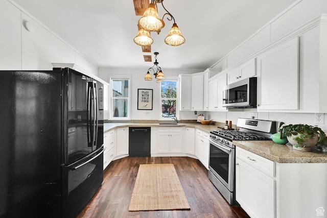 408 E 1700 S, Salt Lake City, UT 84115 - kitchen featuring white cabinetry, black appliances, light countertops, a notable chandelier, and dark wood-style floors