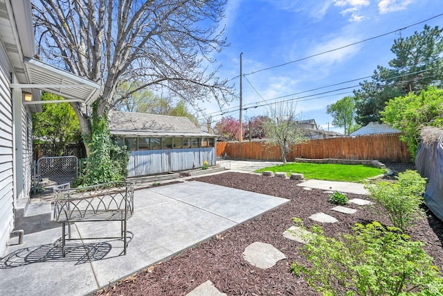 408 E 1700 S, Salt Lake City, UT 84115 - view of yard featuring a patio and a fenced backyard