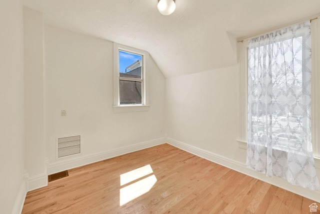 408 E 1700 S, Salt Lake City, UT 84115 - bonus room with light wood finished floors, baseboards, vaulted ceiling, and visible vents