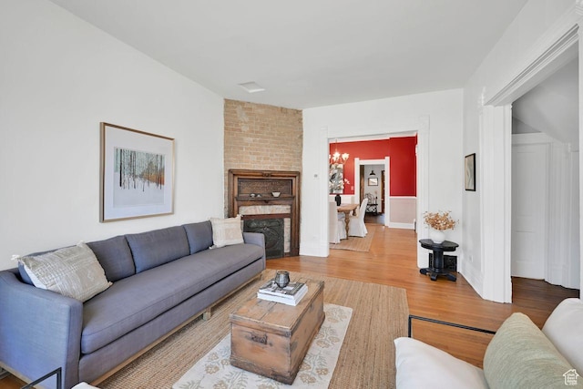 408 E 1700 S, Salt Lake City, UT 84115 - living room featuring a notable chandelier and wood finished floors
